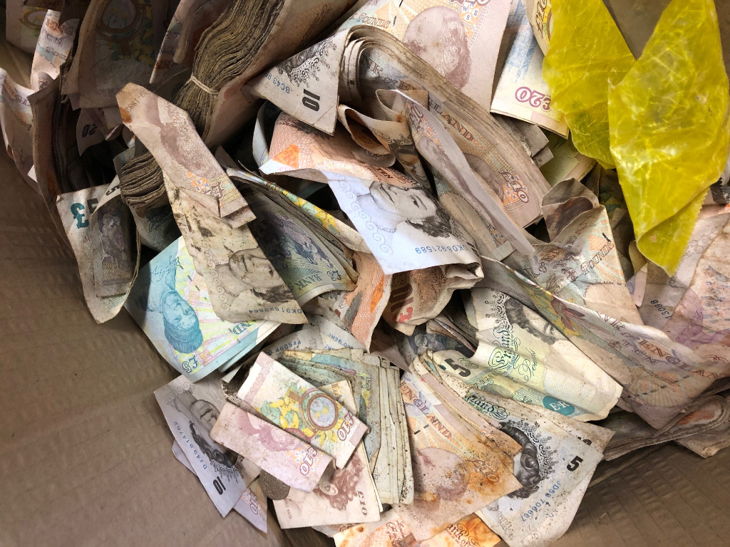 U.K. metal scrappers find $35,000 in old safe — and give it all to charity